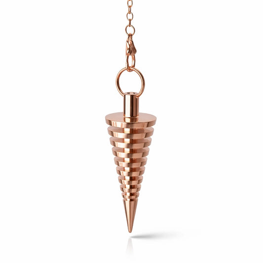 pendule cone gradin en métal cuivré