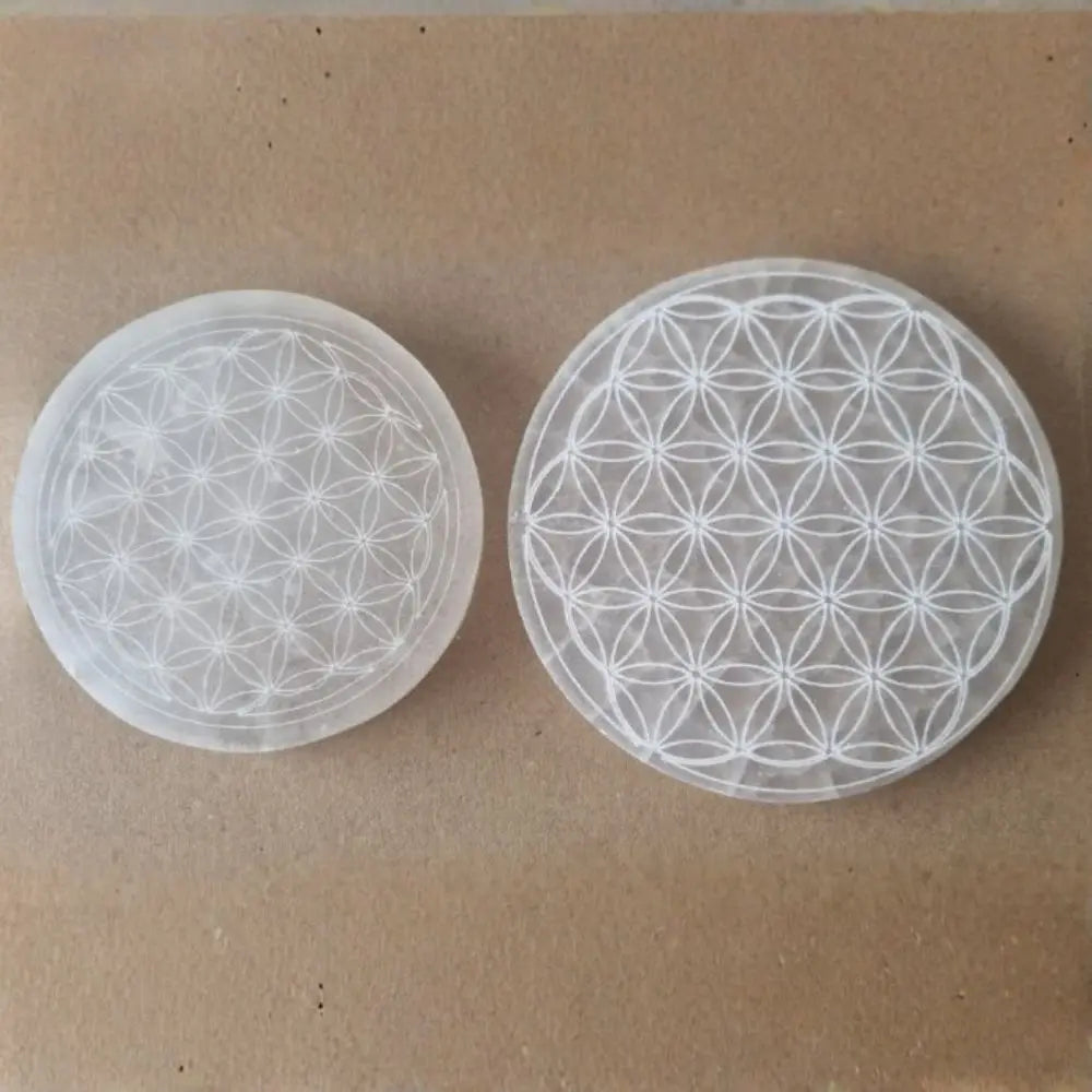 Fleur de vie en sélénite en plaque de 10  ou 12 cm de diamètre pour purifier et recharger vos pierres et pendules