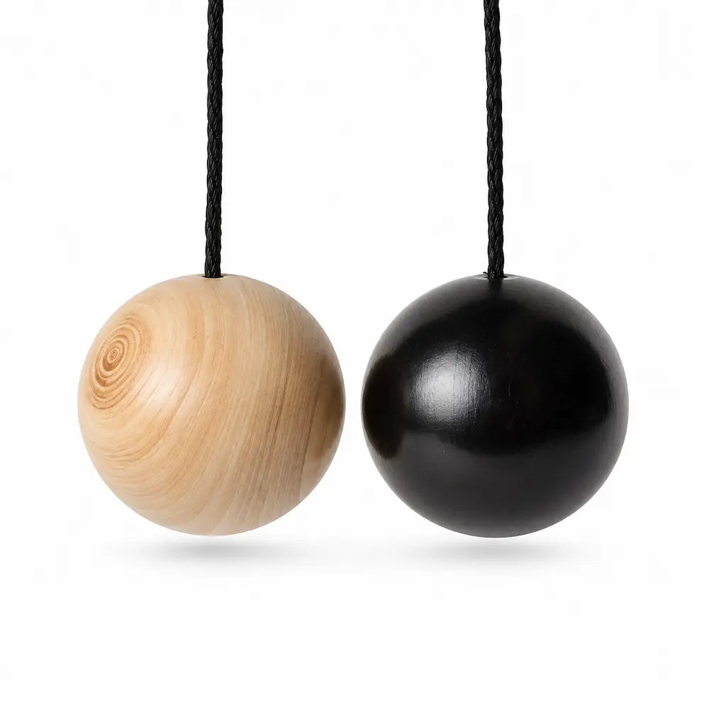 Pendules boule en bois de buis naturel et noir