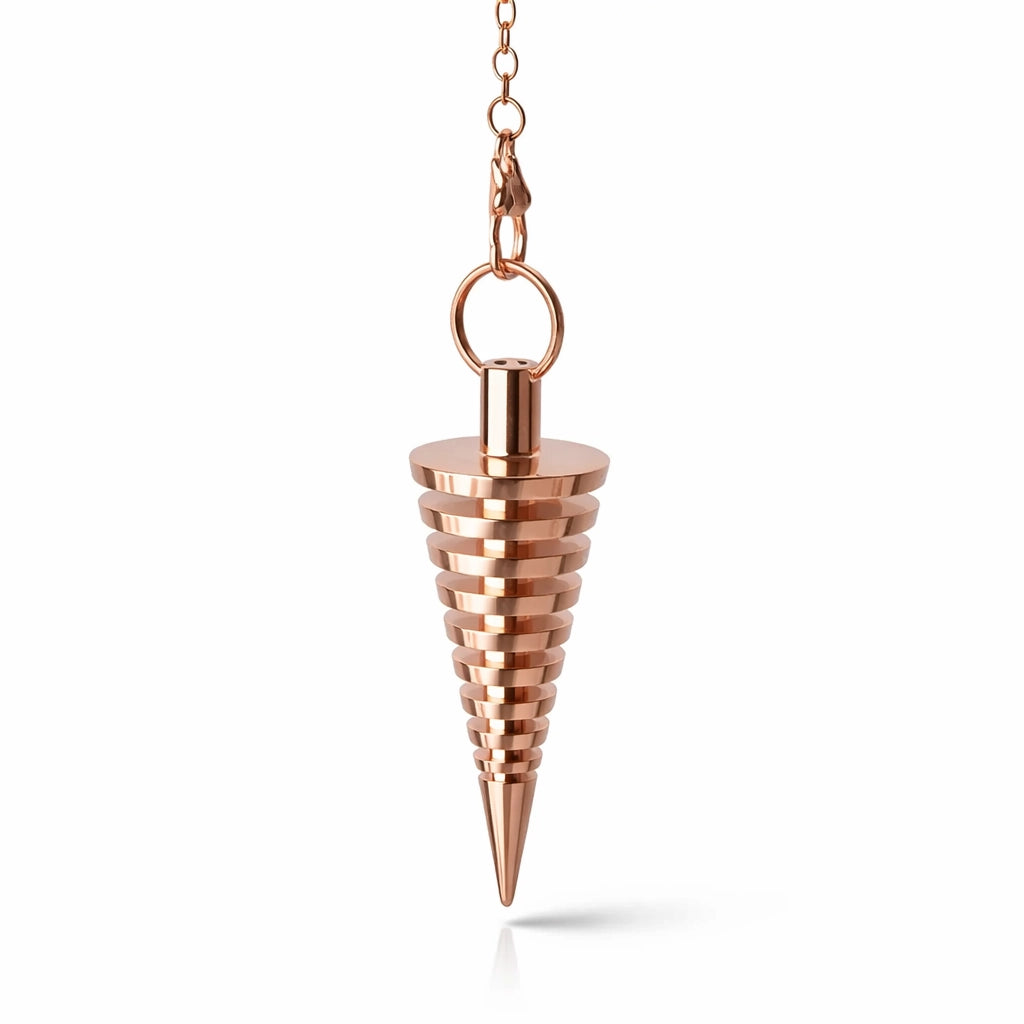 pendule cone gradin en métal cuivré