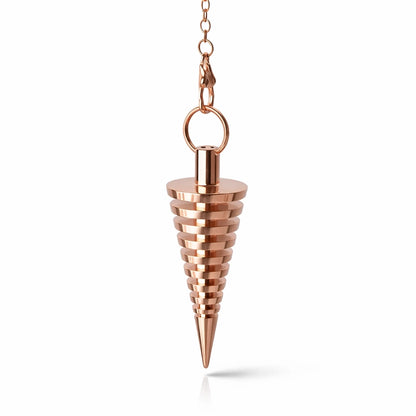pendule cone gradin en métal cuivré