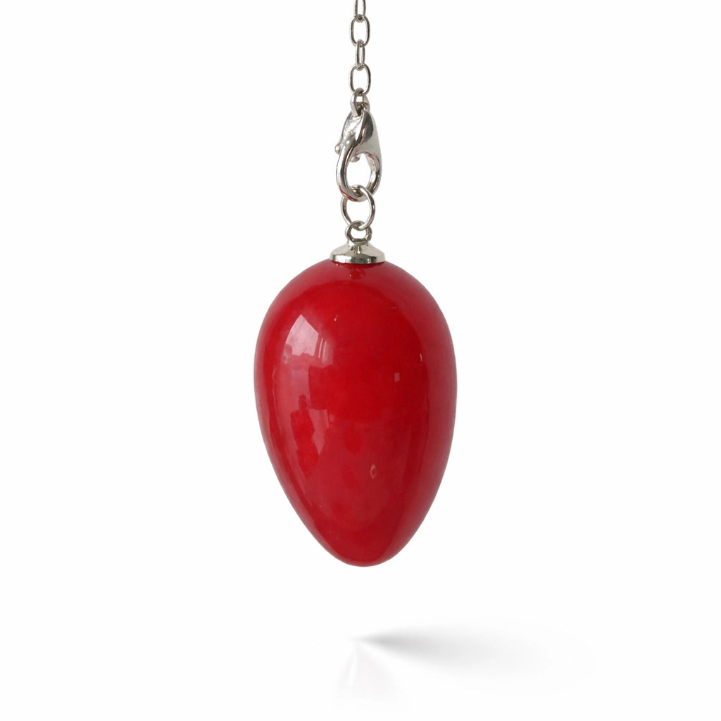 Pendule forme œuf en cornaline orangée pour divination équilibrée
