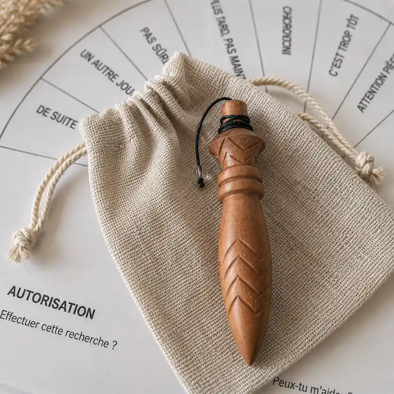 Pendule de thot en jujubier plombé et son pochon