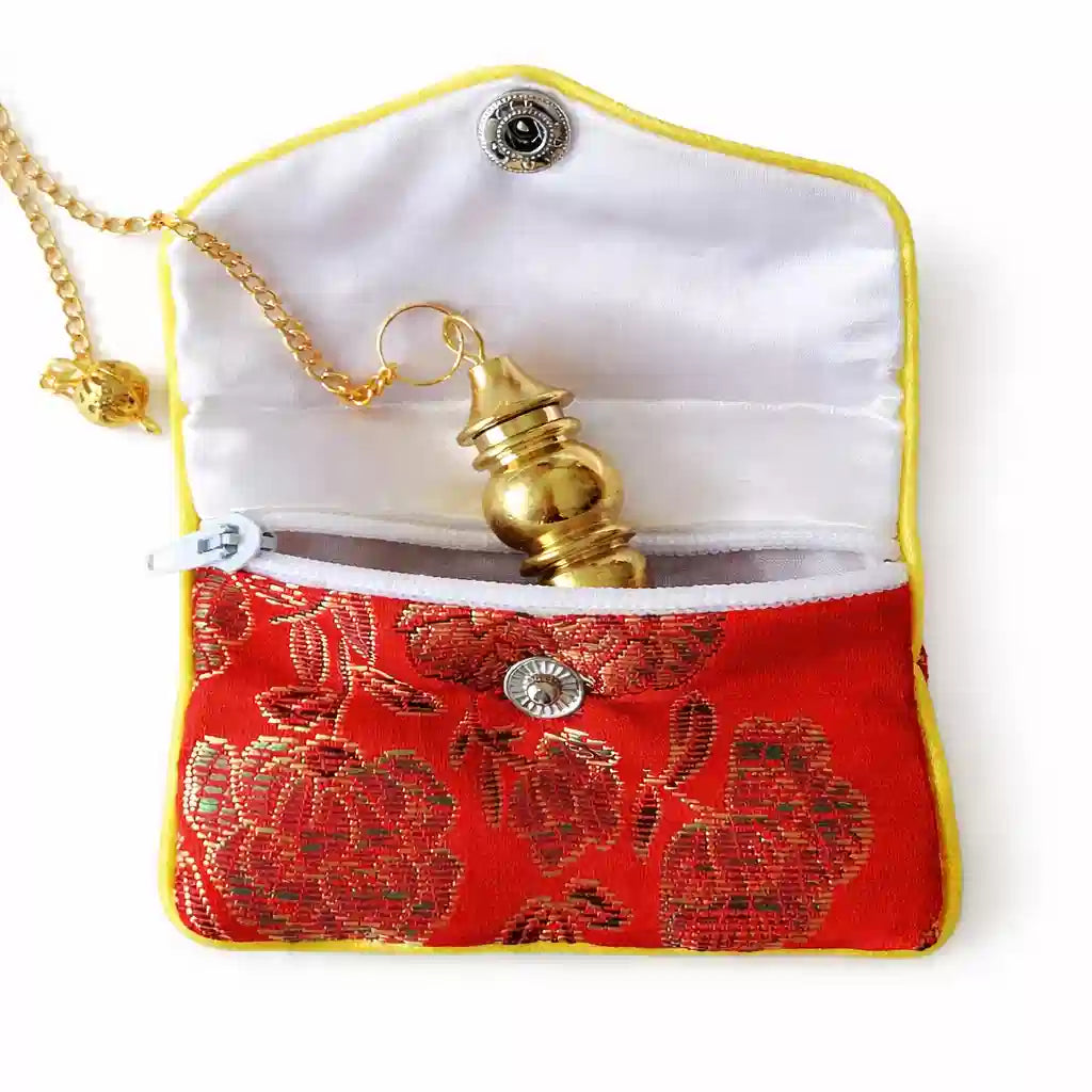 Pochette pendule en tissu brodé beige avec fermeture éclair et pendule à l’intérieur