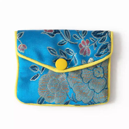 Pochette pendule en tissu fleuri bleu avec fermeture éclair